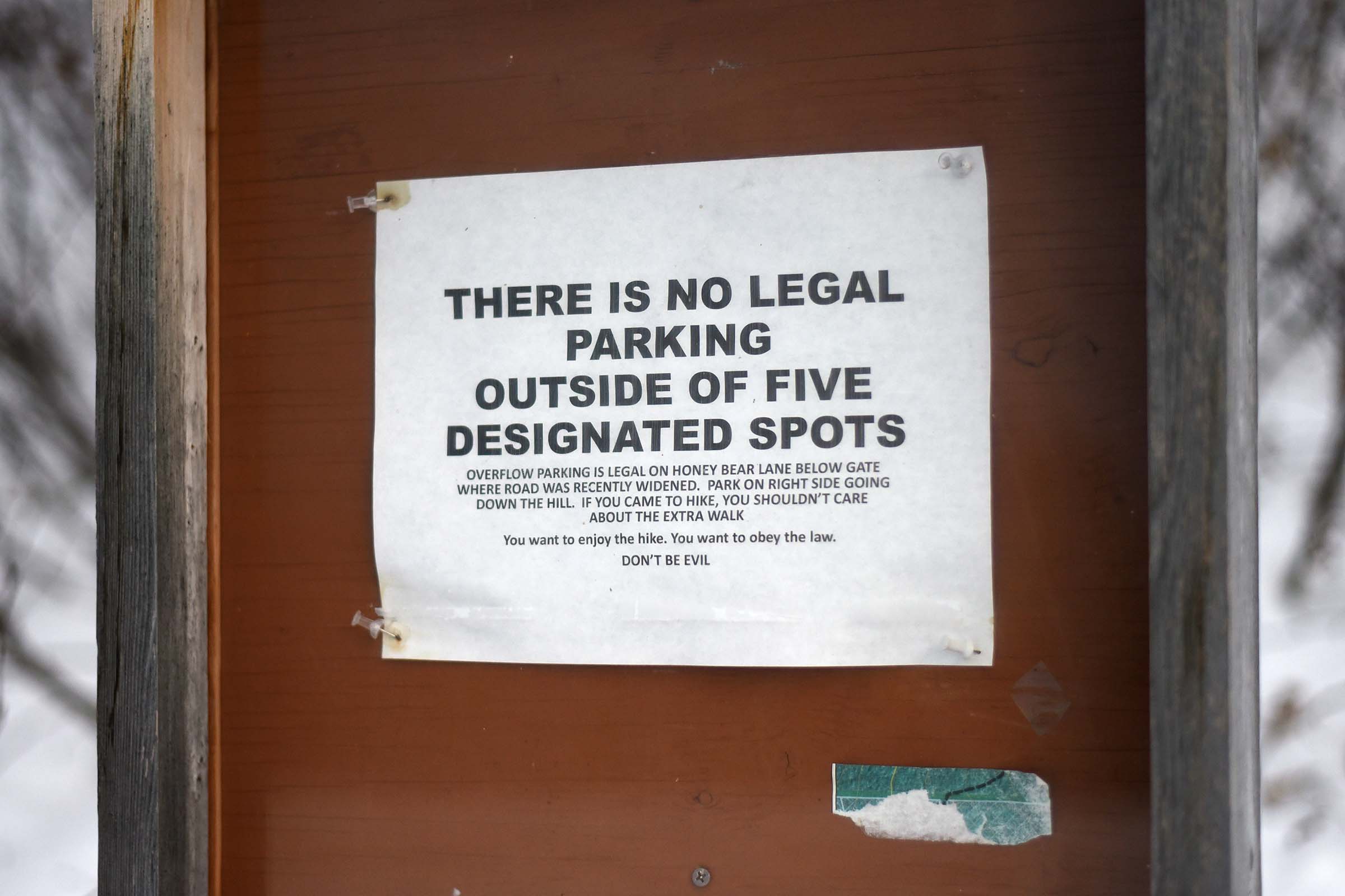 Sign warning hikers on at the Honey Bear trailhead in Bear Valley