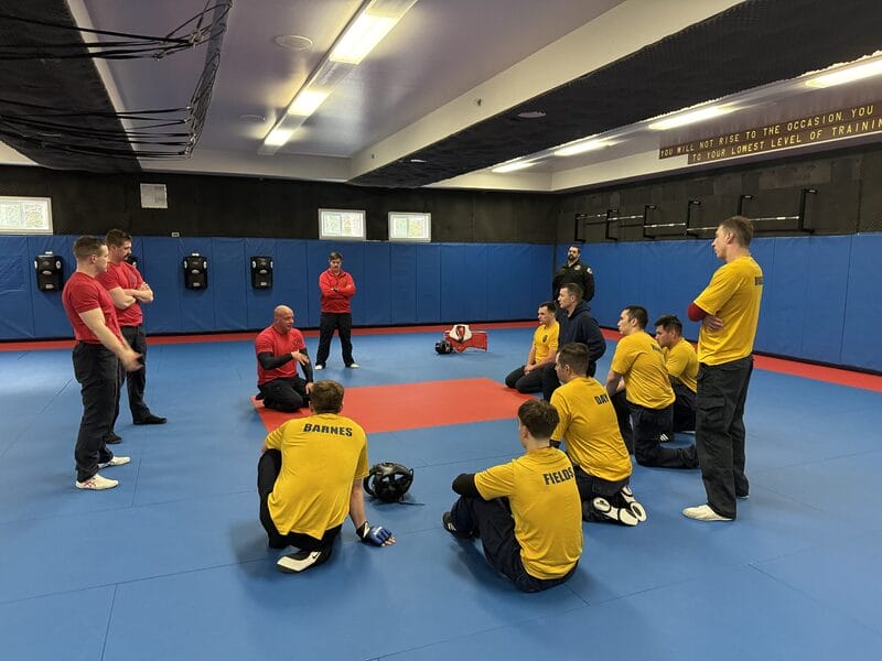 Corporal Mank instructing recruits 